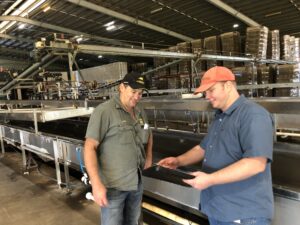 Gavin Eilers of Tropicana Bananas, who is a member of the Project Reference Group with Caleb Connolly (DPI)